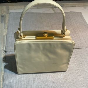 Never used Prestige ivory purse. Coin purse/ comb and mirror included